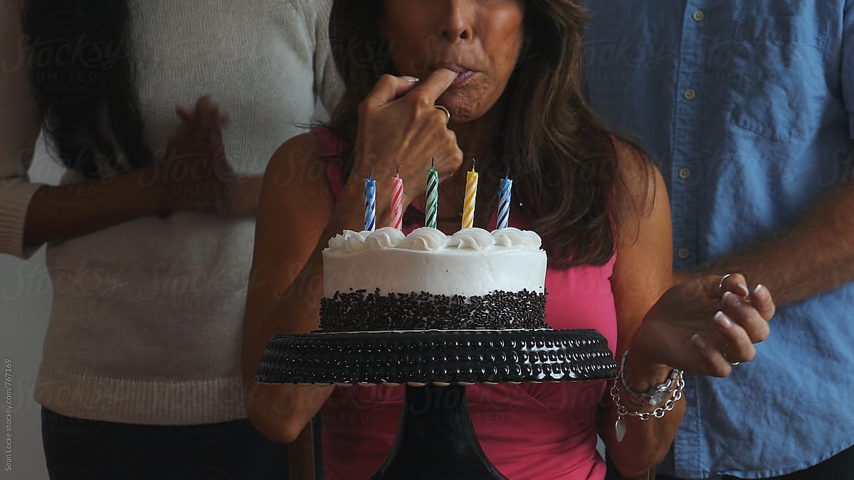 Woman Tastes Icing After Blowing Out Candles