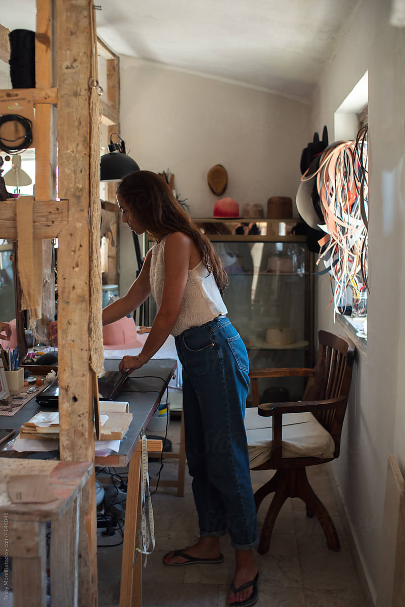 Woman working in her atelier small business