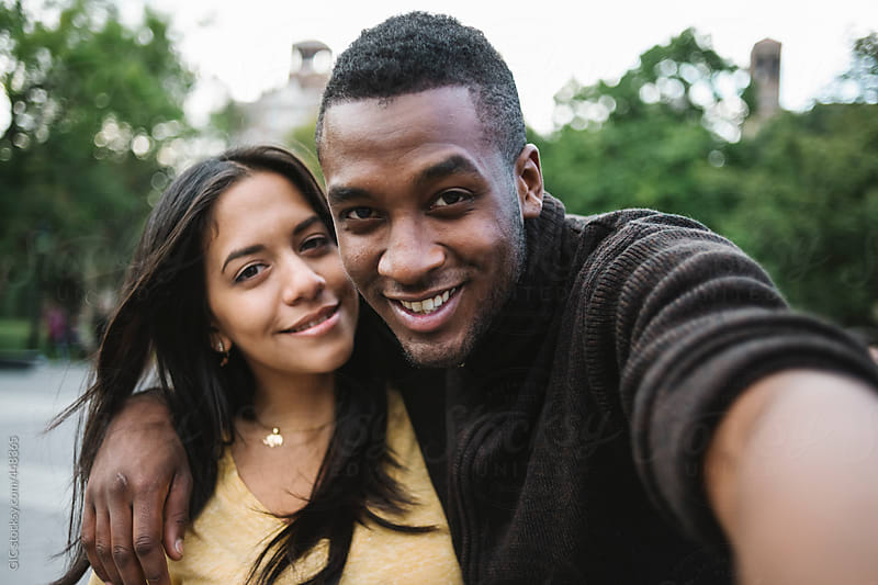 Black Young Couple Taking A Selfie In The City By Gic Couple 