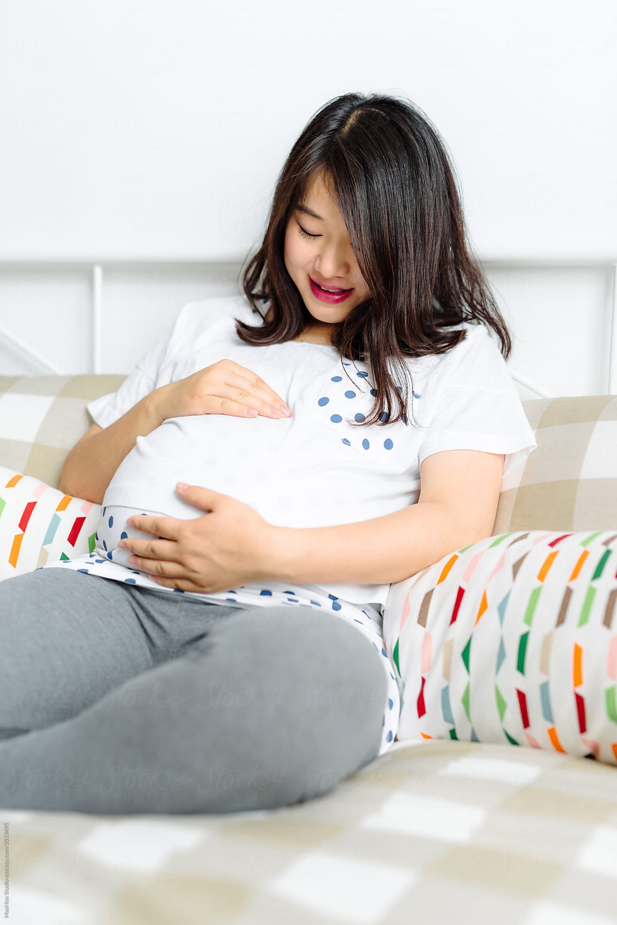 Pregnant Woman Having A Rest On Bed By Stocksy Contributor Maahoo Stocksy