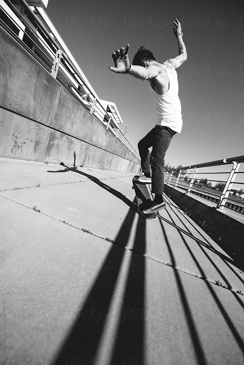 Skateboard Ollie from behind