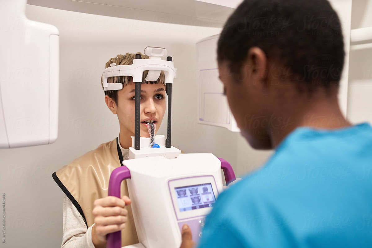 Patient in dental radigraphy machine
