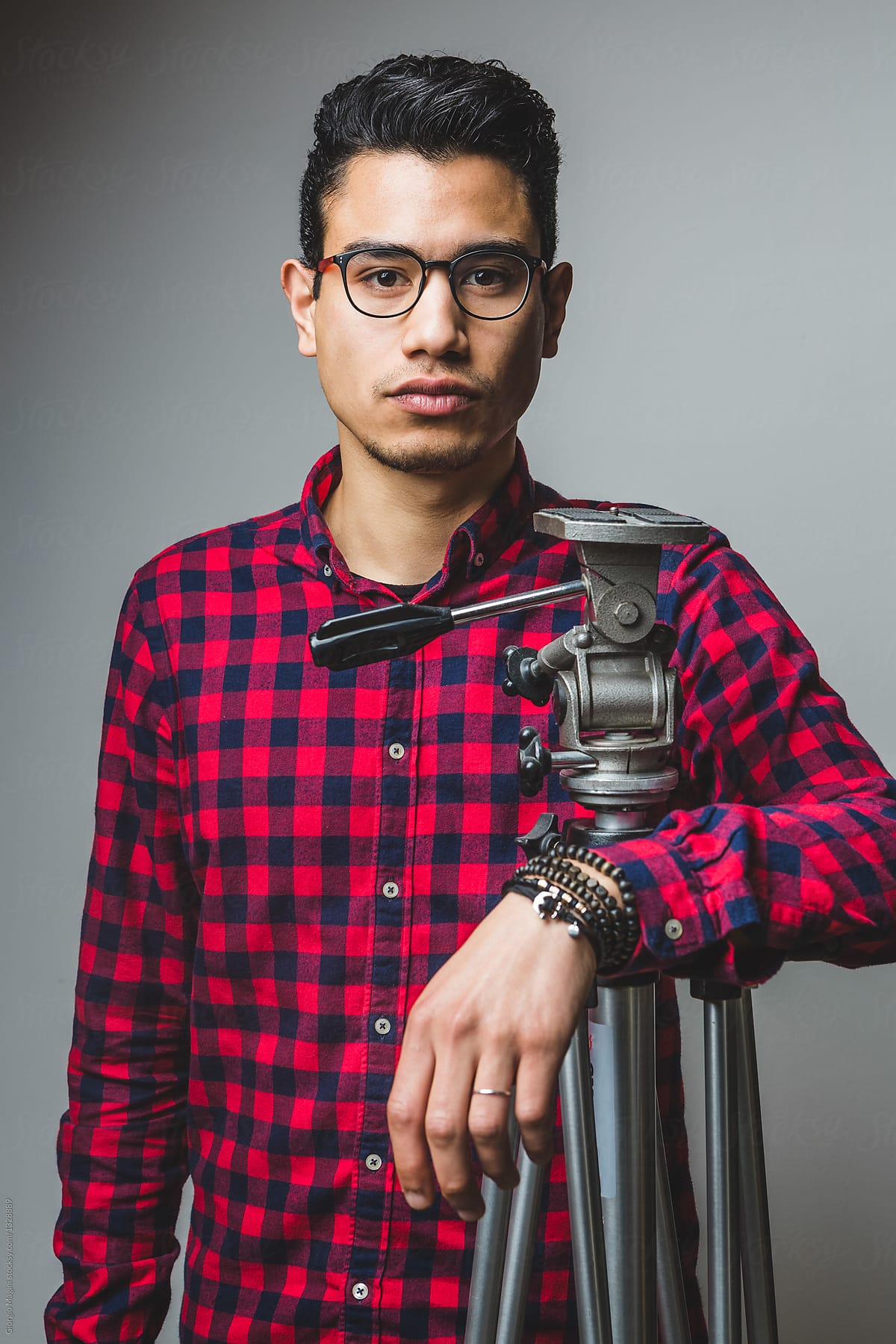 Young Photographer Portrait with a Tripod