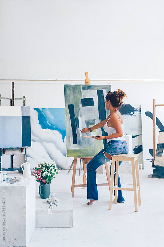 Woman Artist Painting in Her Studio