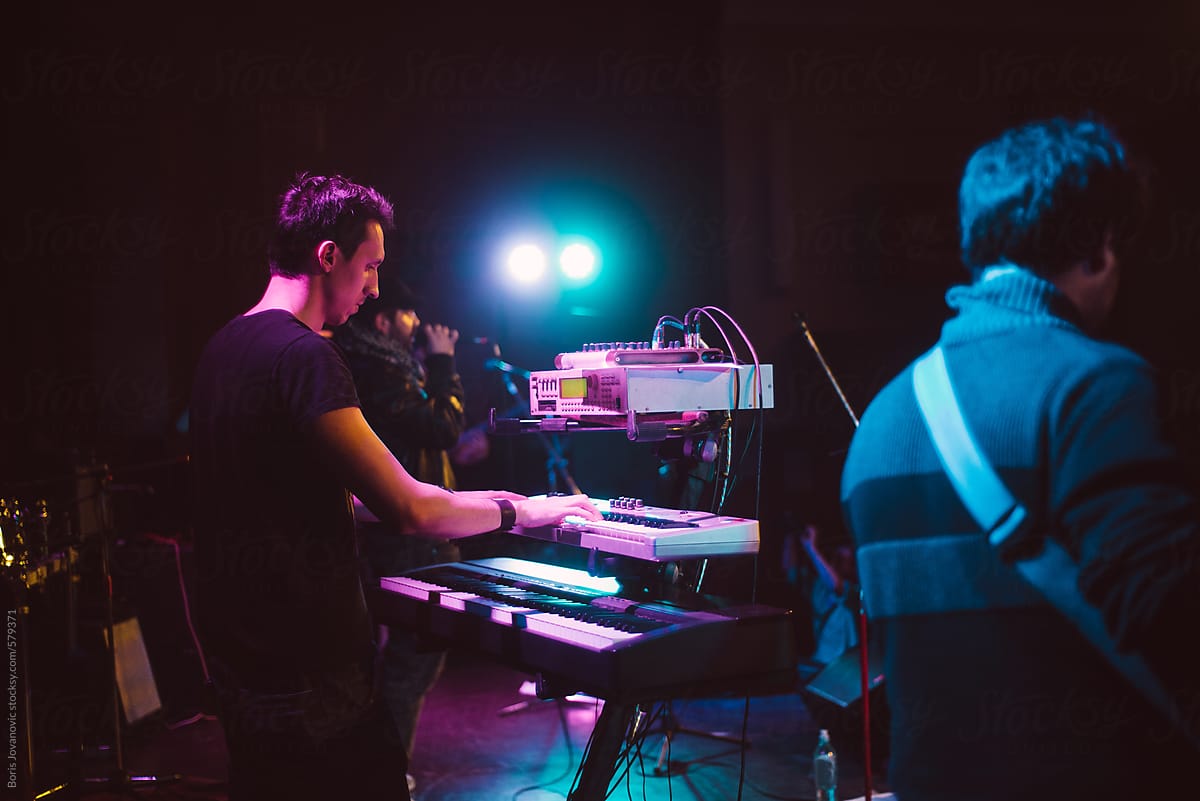 Man playing keyboards on the stage