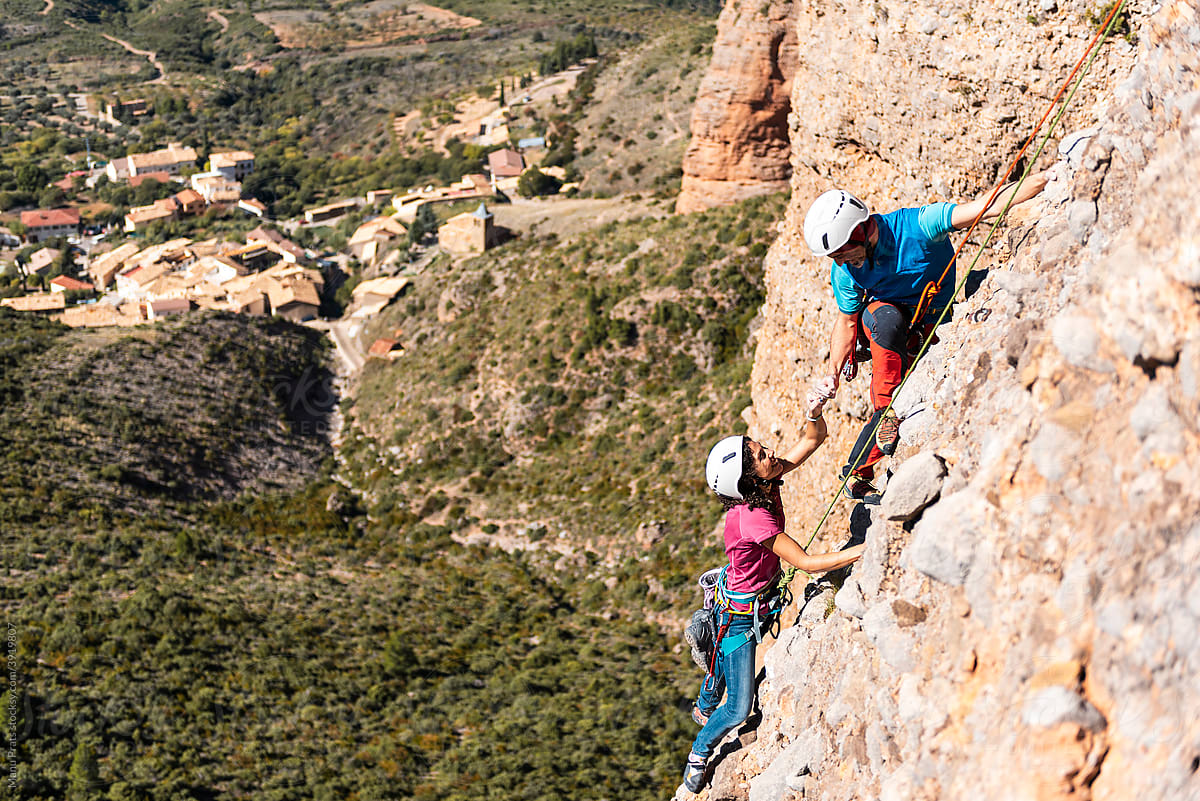 Woman climber, woman rock climbing