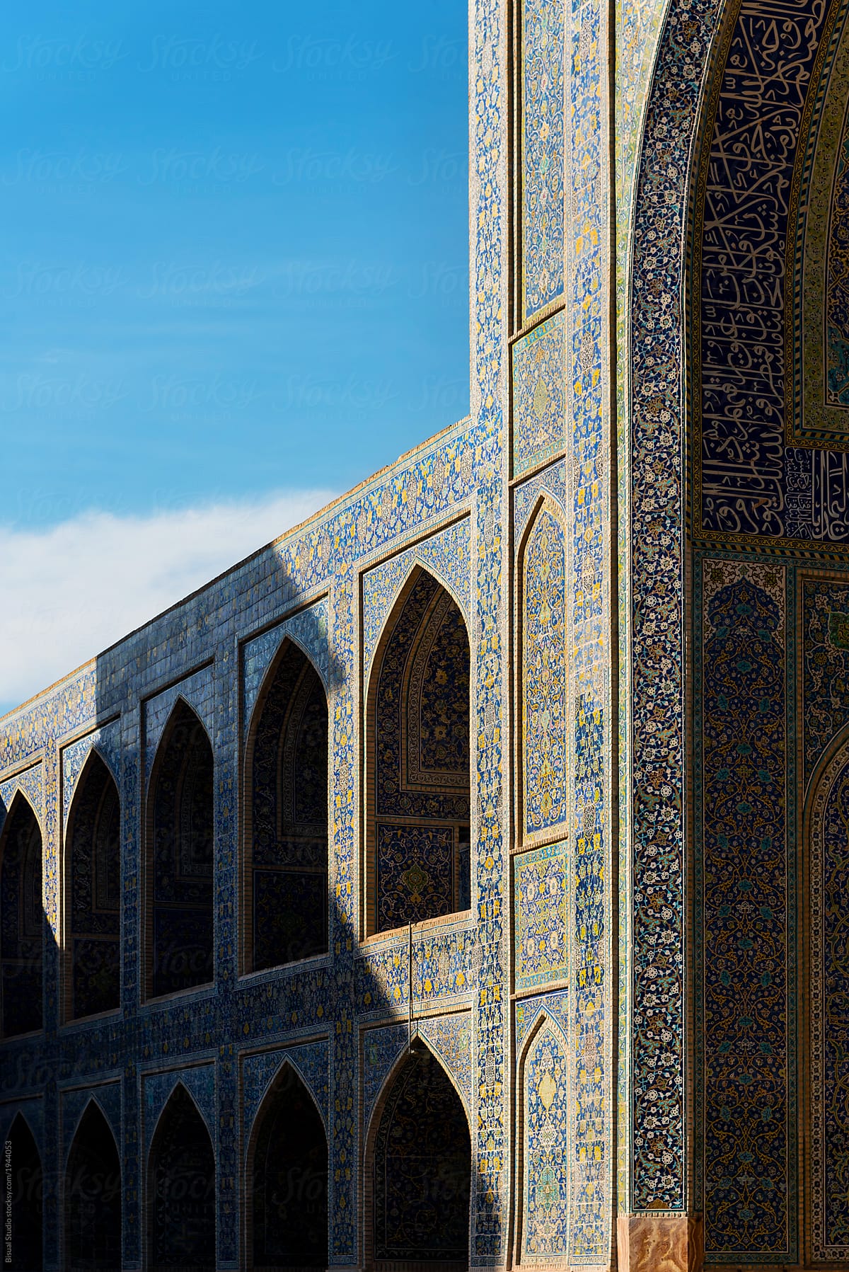 Details of the courtyard walls inside the Shah Mosque in Isfahan, Iran,