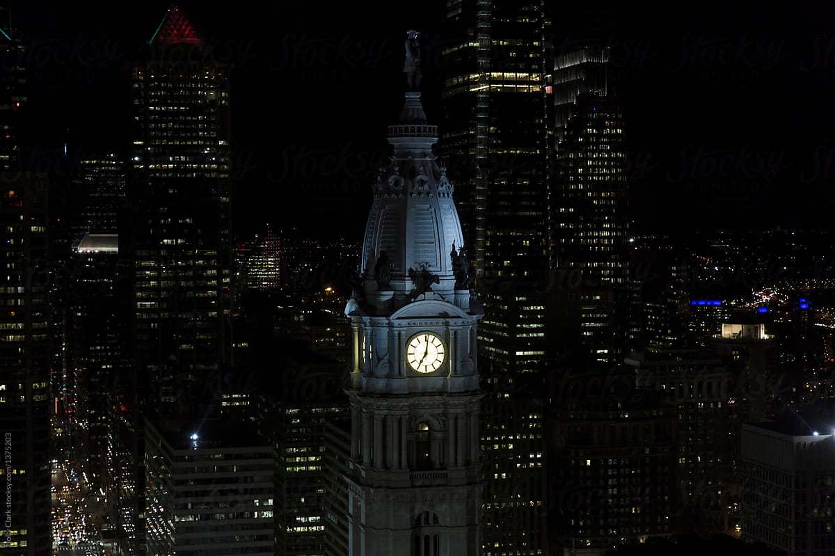 Night View of Philadelphia City Hall\'s brightly lit clock tower