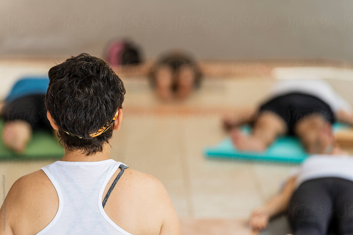 Yoga instructor giving a class for older adults