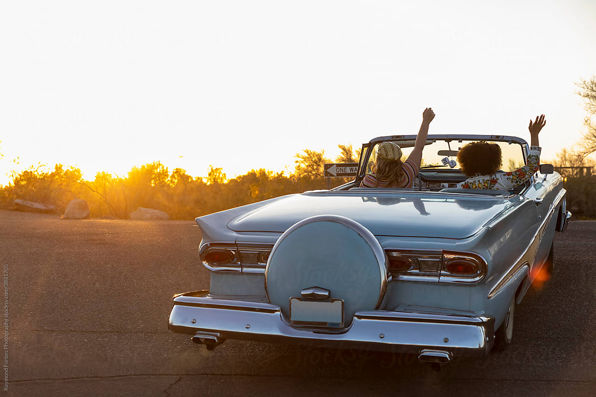 Road Trip in Vintage Car in Arizona at Sunset
