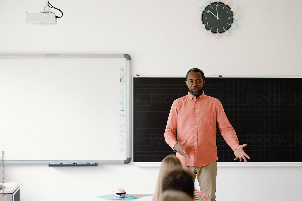 black teacher  back to school explain attention