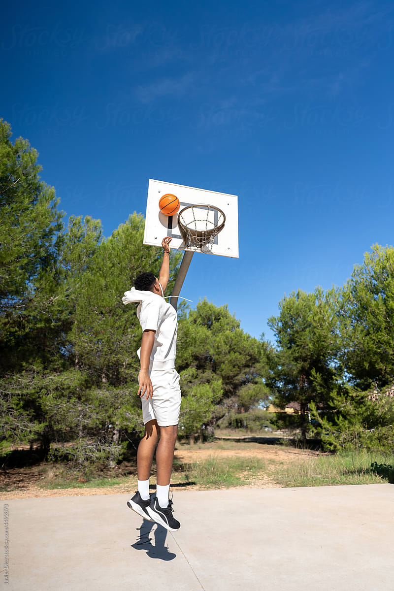 Basketball player in sportsground