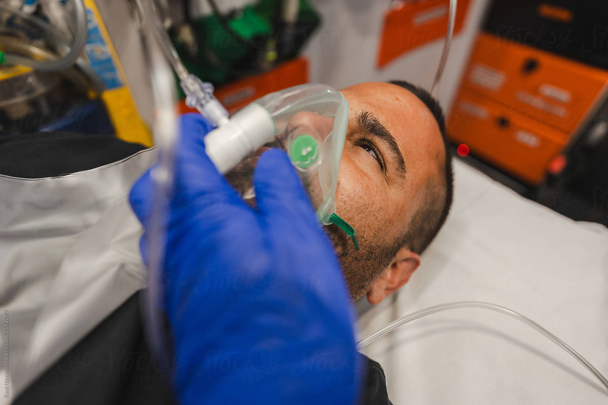 portrait of a sick man in an ambulance.