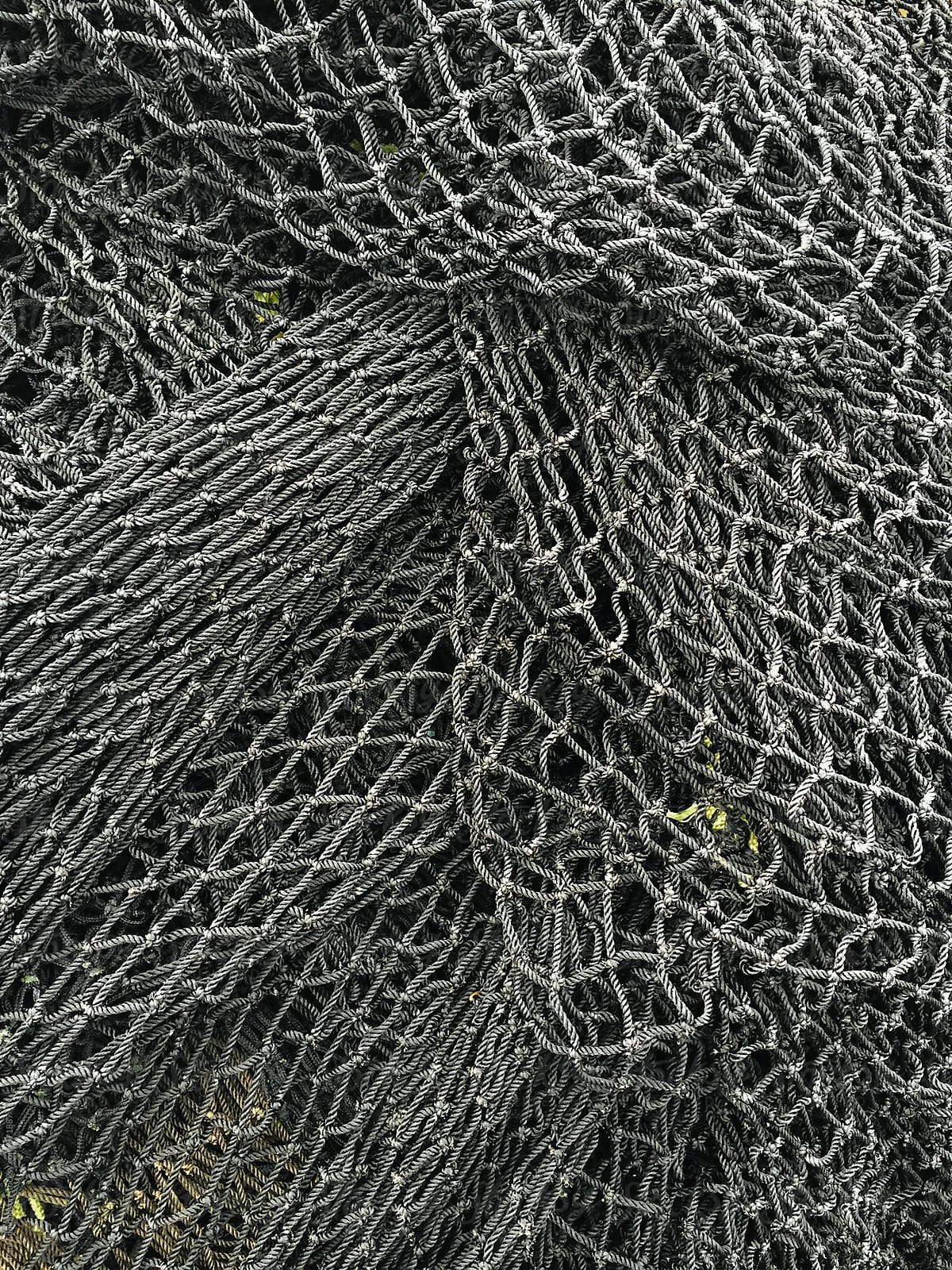 Close up of piles of commercial fishing nets