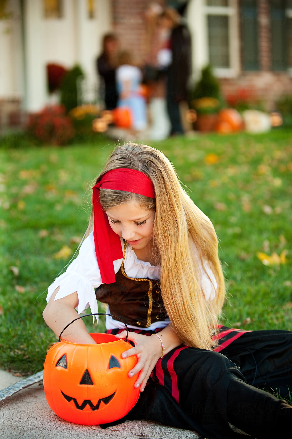 Halloween: Pirate Girl Checks Out Candy Bucket