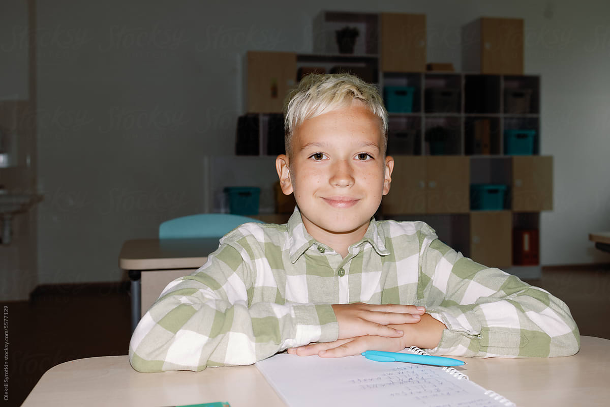 Student schoolchild desk record notebook back to school lesson smile
