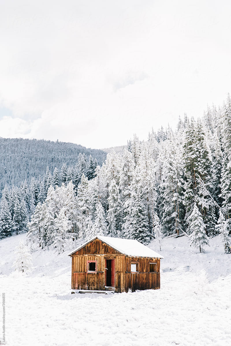 Cabin In The Mountains In The Snow