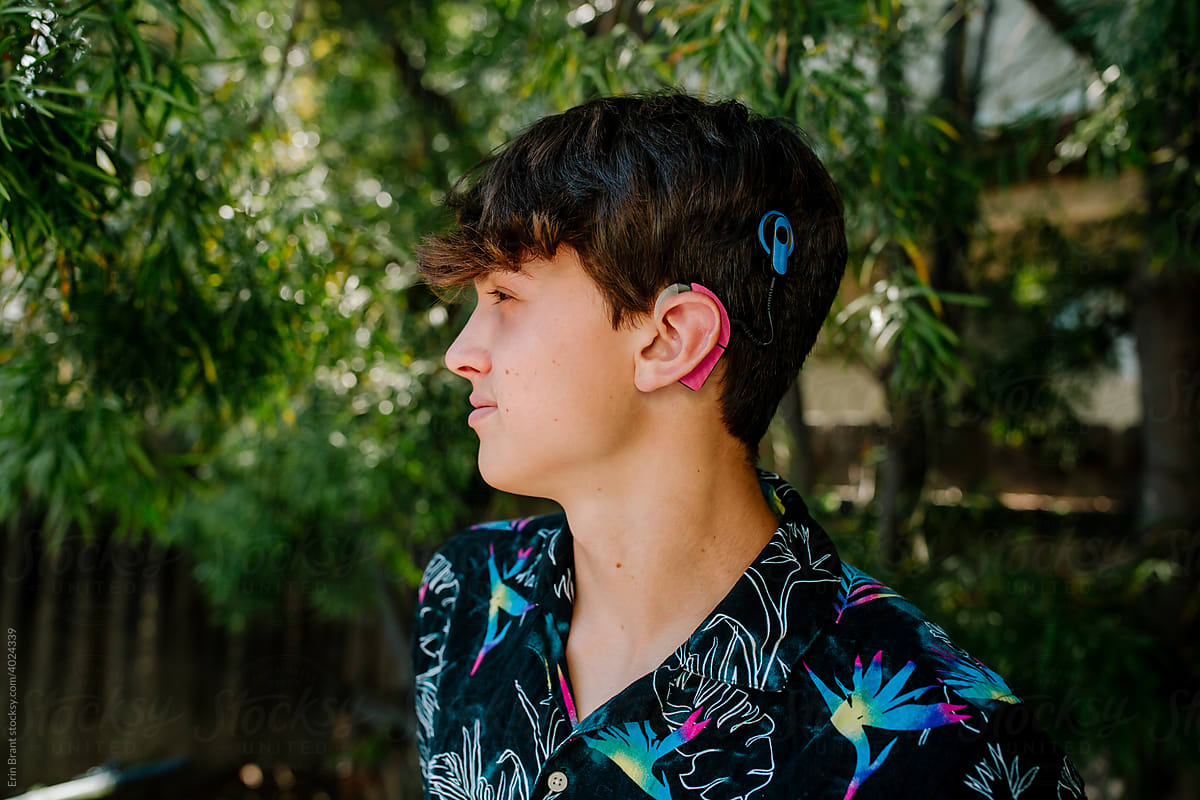 Profile of teen boy with Cochlear implants