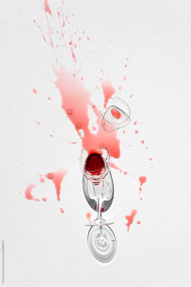 Wine splashed on table from goblet