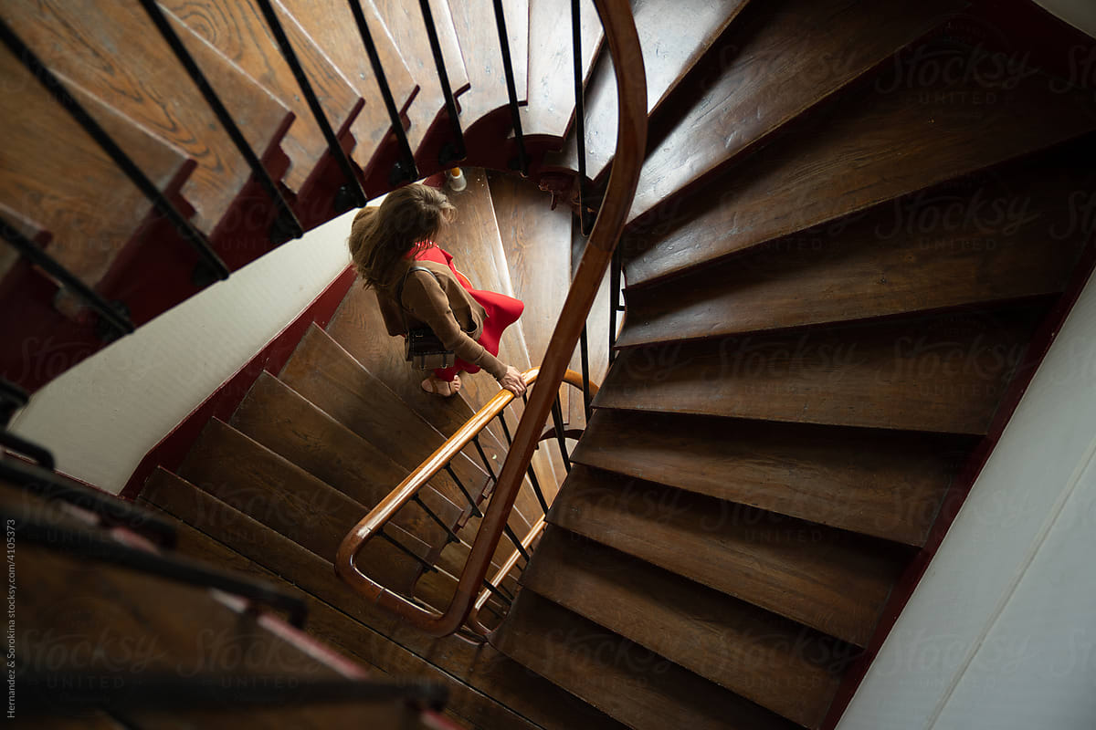 Woman Going Down The Stairway