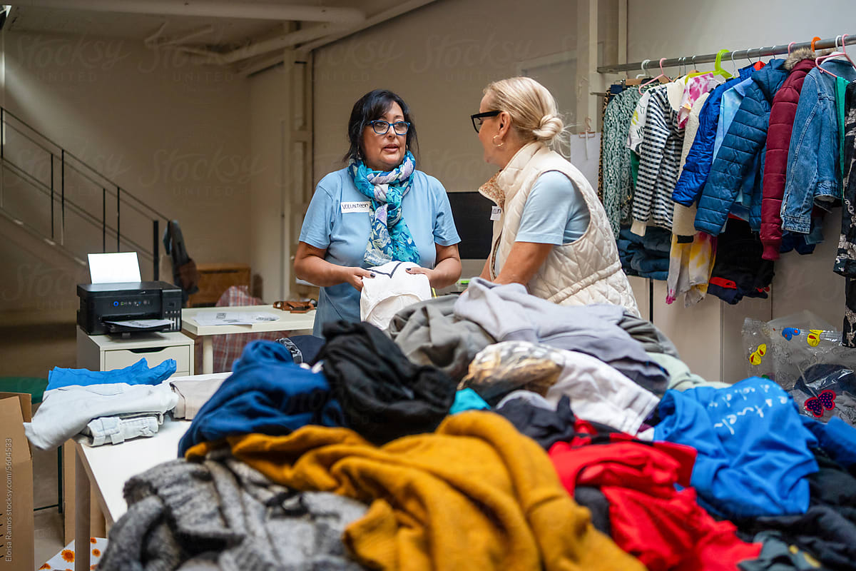 retired women volunteering in a donation center