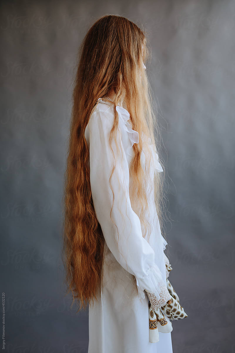 Anonymous woman with long hair fashion portrait