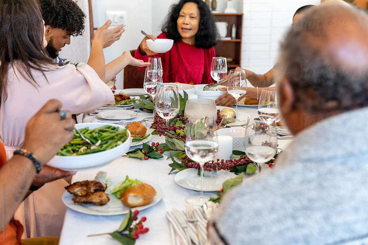 Family Eats Dinner During Holidays