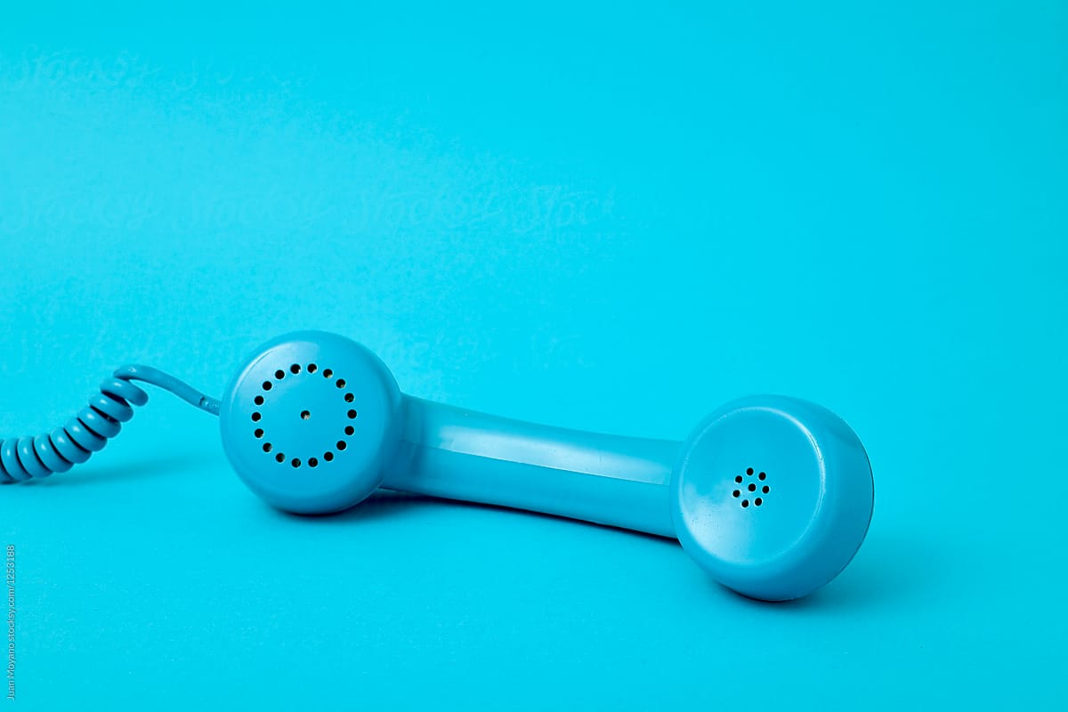 handset of a blue telephone