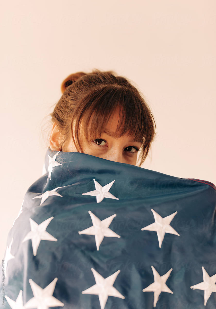 young asian woman with US flag