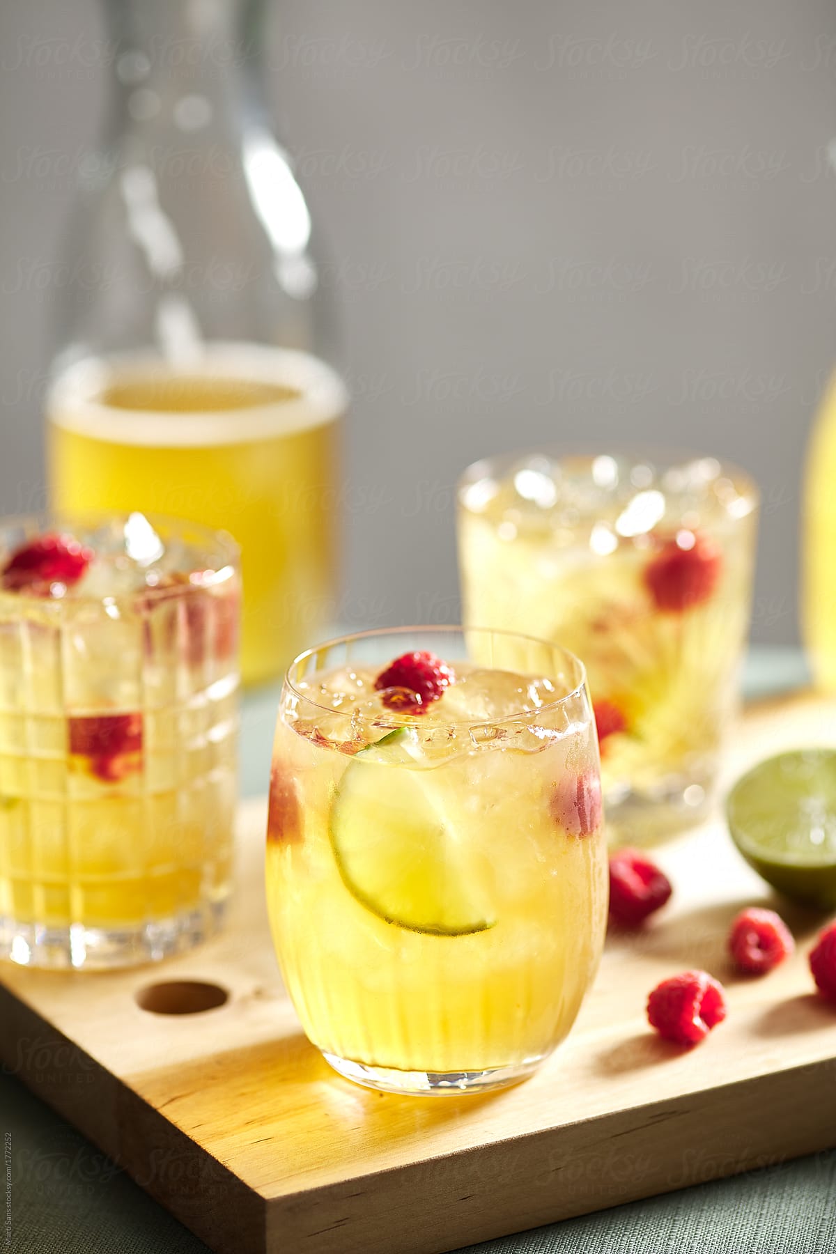 Kombucha cocktail with tea, raspberry and lime.