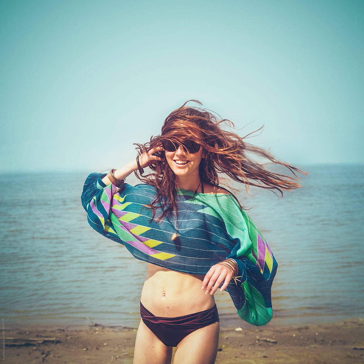 Smiling Woman On The Beach By Stocksy Contributor Lumina Stocksy