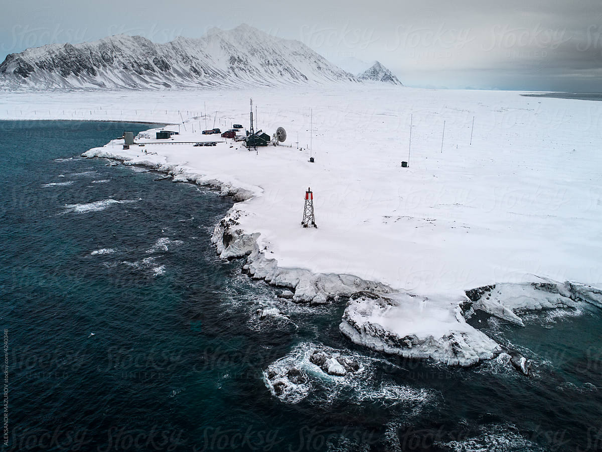 Arctic radio tower on the snowy coast