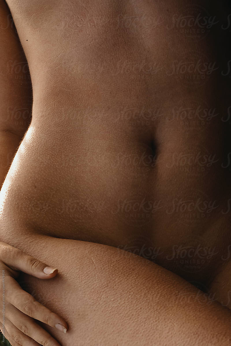 Close up tanned tanned girl belly