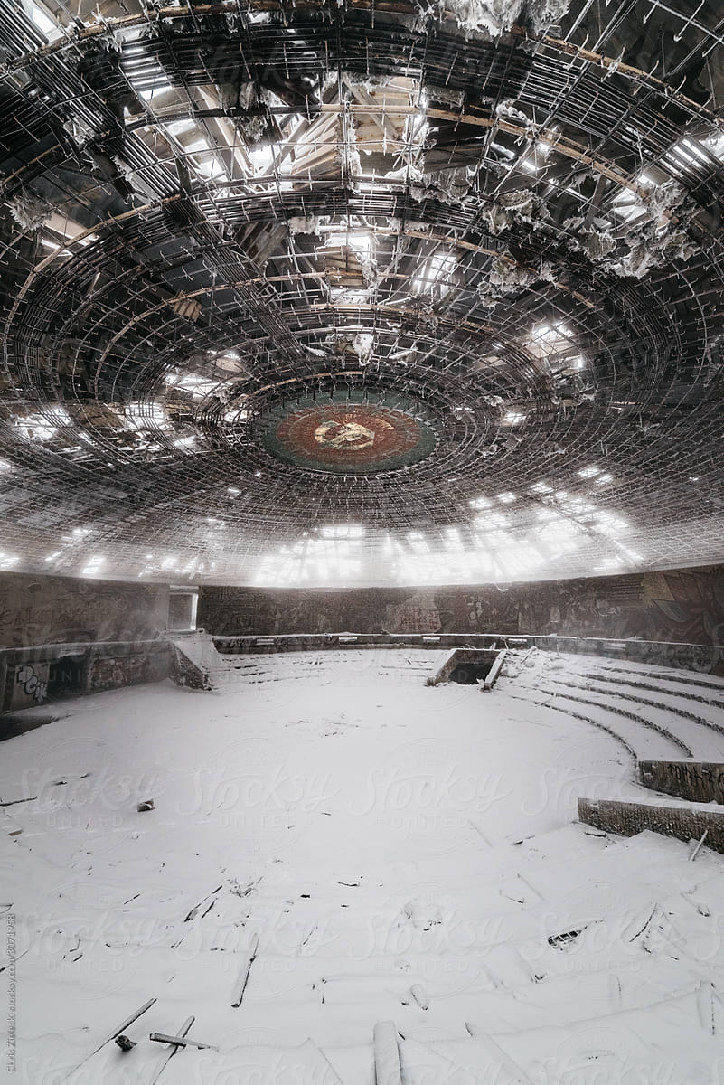 Snowy arena inside abandoned monument