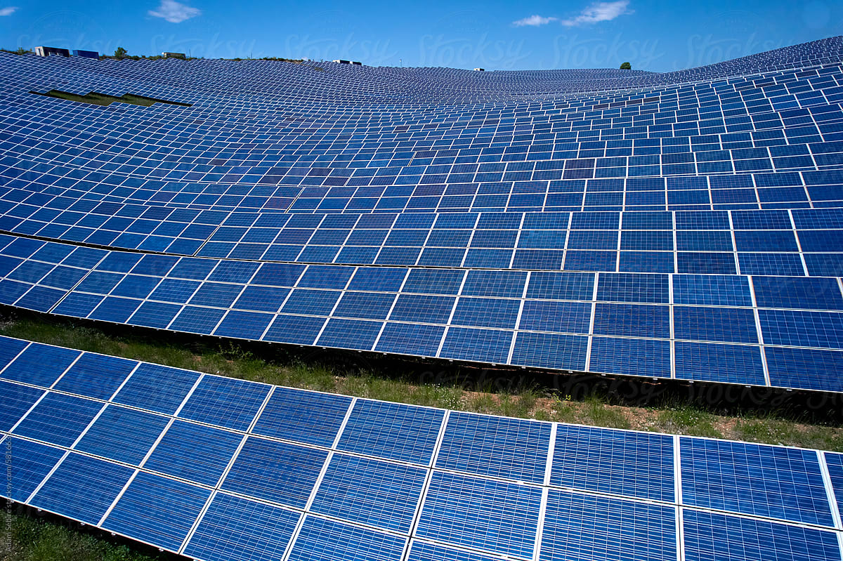 Renewable energy revolution - solar cells cover hilly farmland