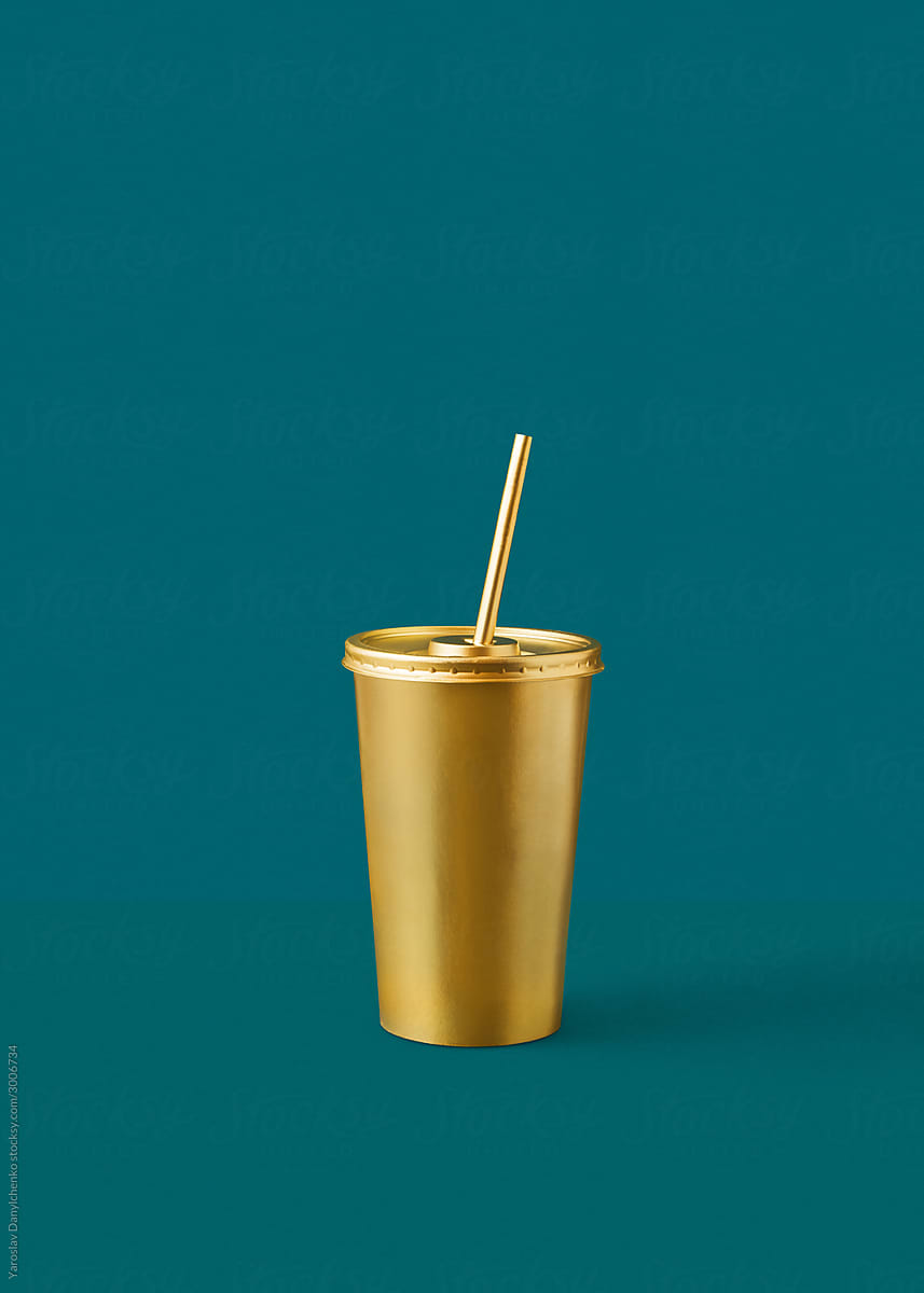 Mock-up cup painted golden.