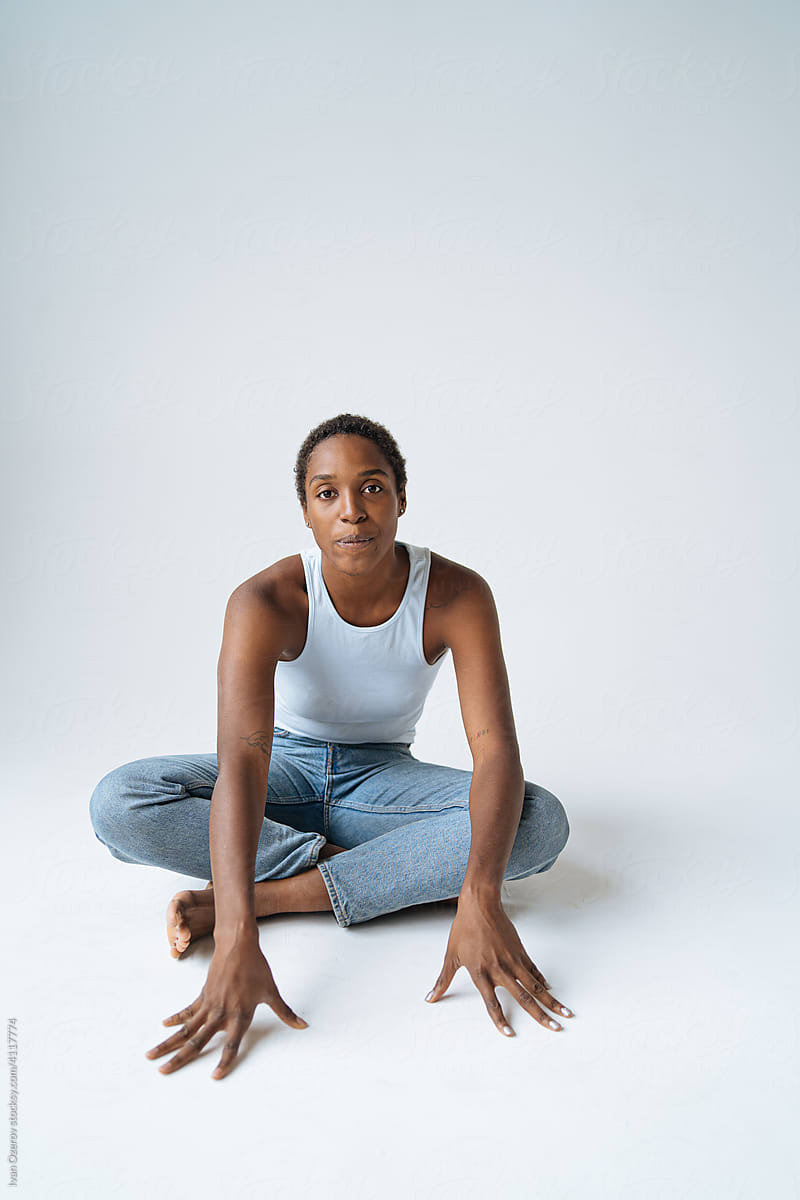 Black woman on floor in studio