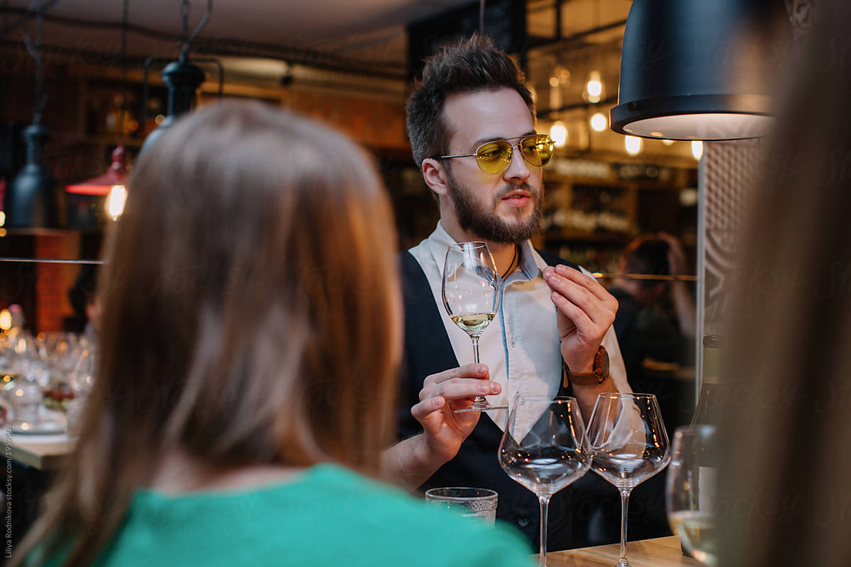 Wine expert talking about wine at restaurant