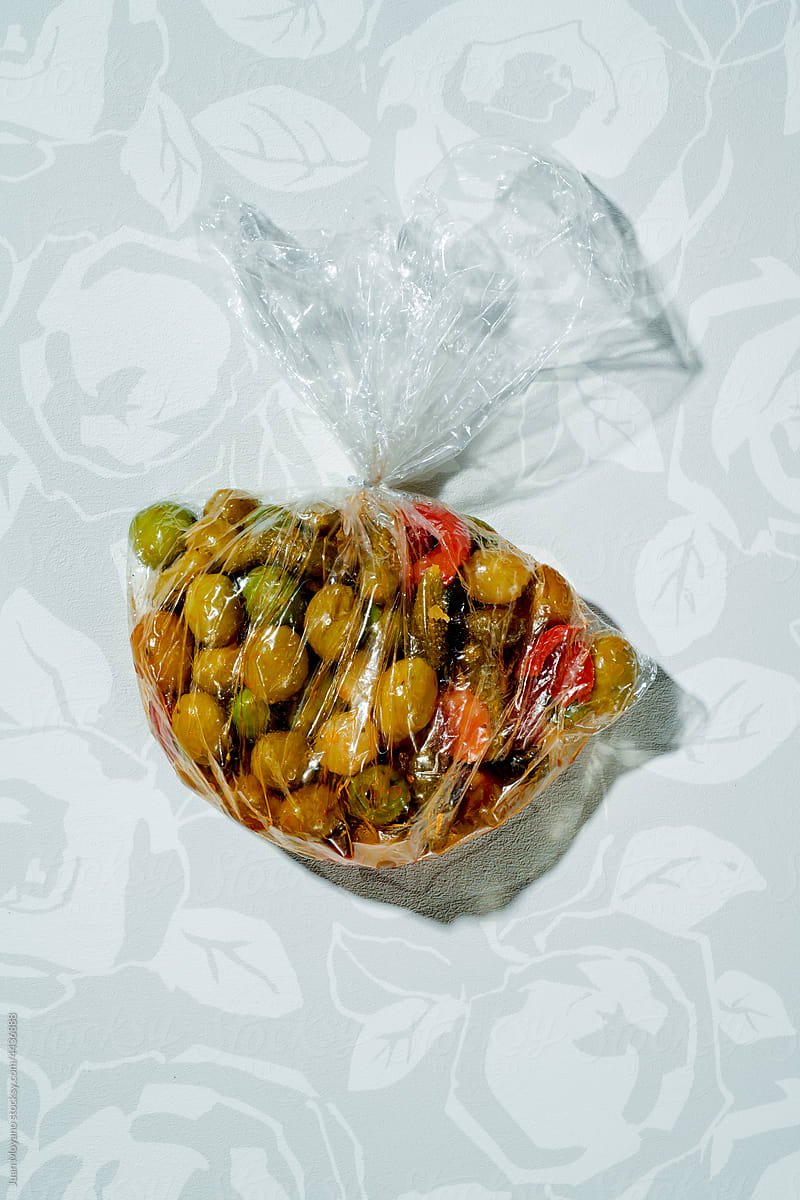 spanish olives and pickles in a plastic bag