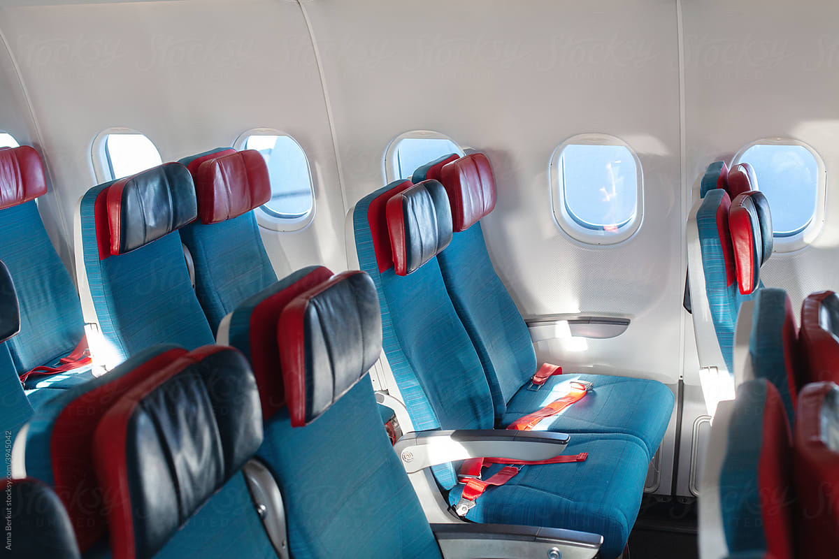 aircraft interior with empty seats, inside airplane