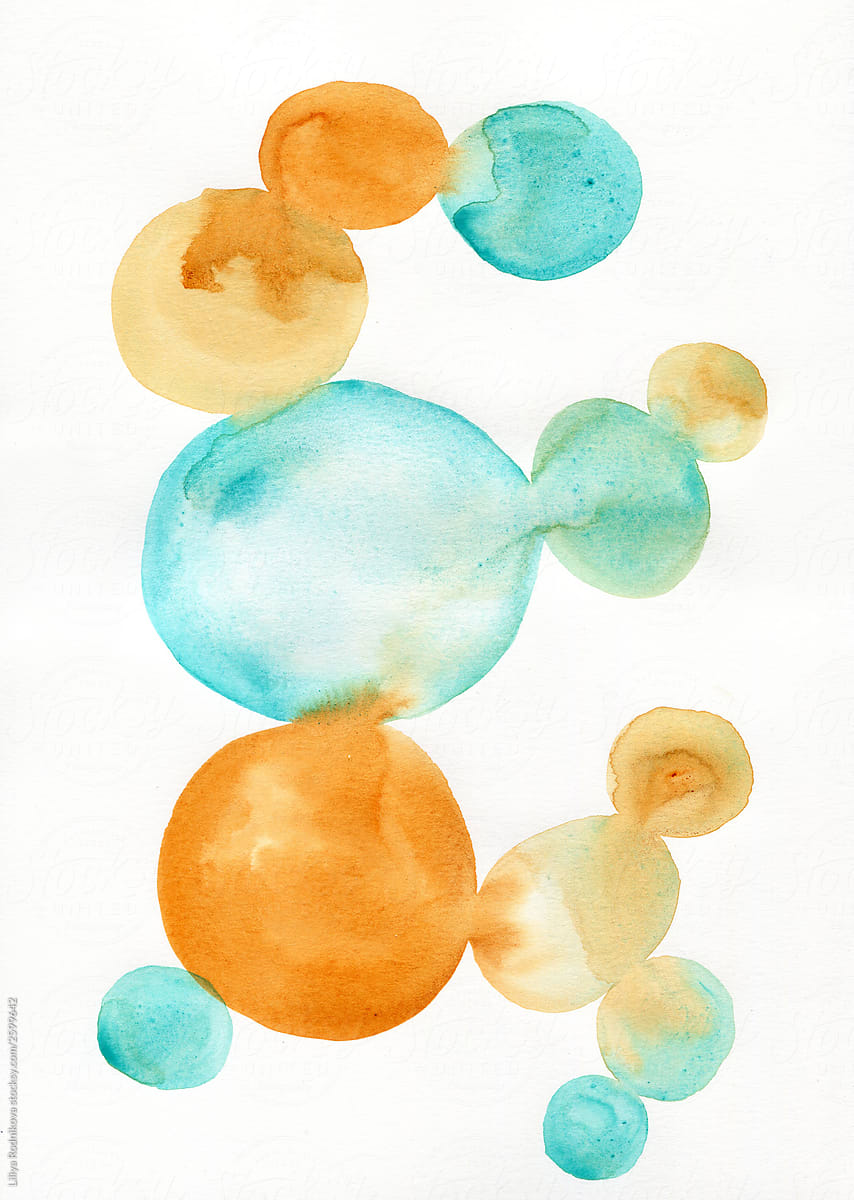 Turquoise and yellow dots on white paper