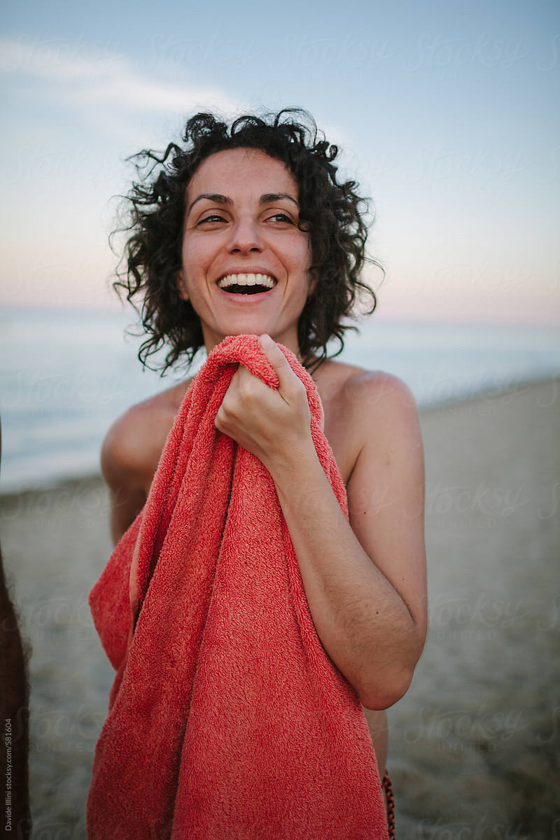 Woman On The Beach By Stocksy Contributor Davide Illini Stocksy