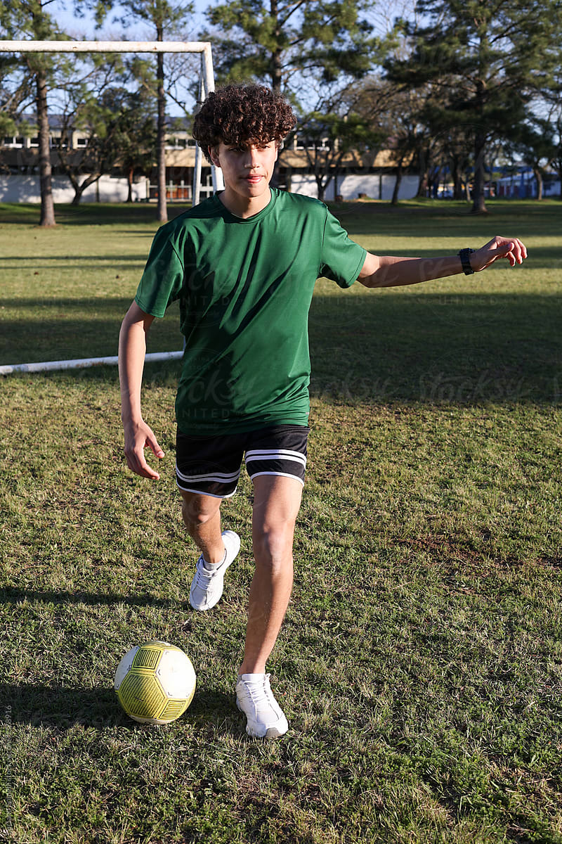 Young man doing soccer tricks with a ball