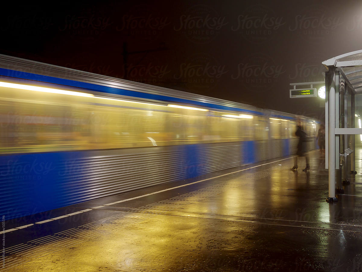 Metro train in foggy night