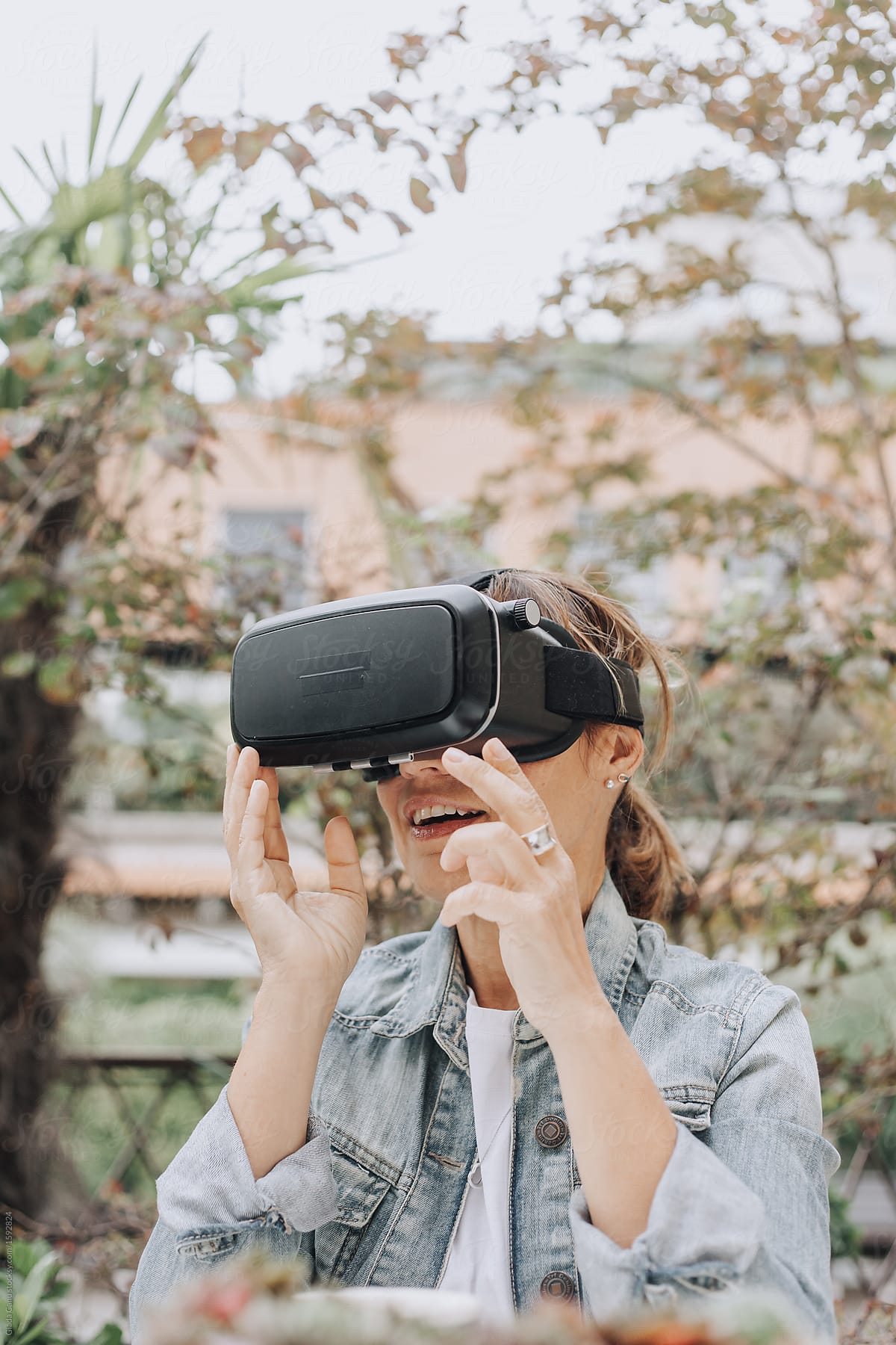 middle-aged Woman enjoying virtual reality