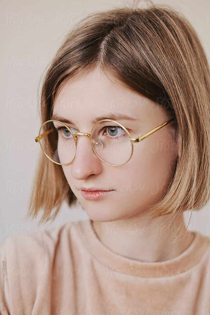 Portrait Of Blonde Female In Glasses By Stocksy Contributor Sergey Filimonov Stocksy