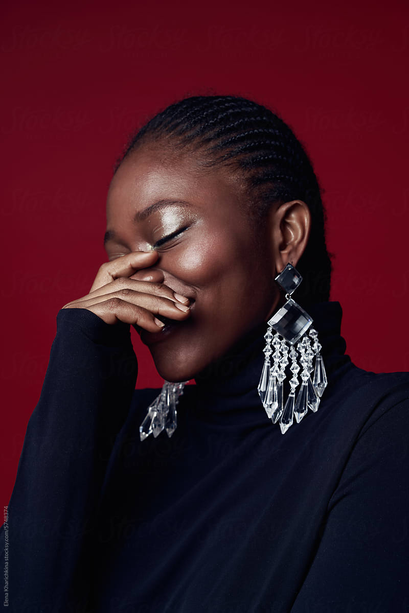 Portrait of a black woman in large earrings