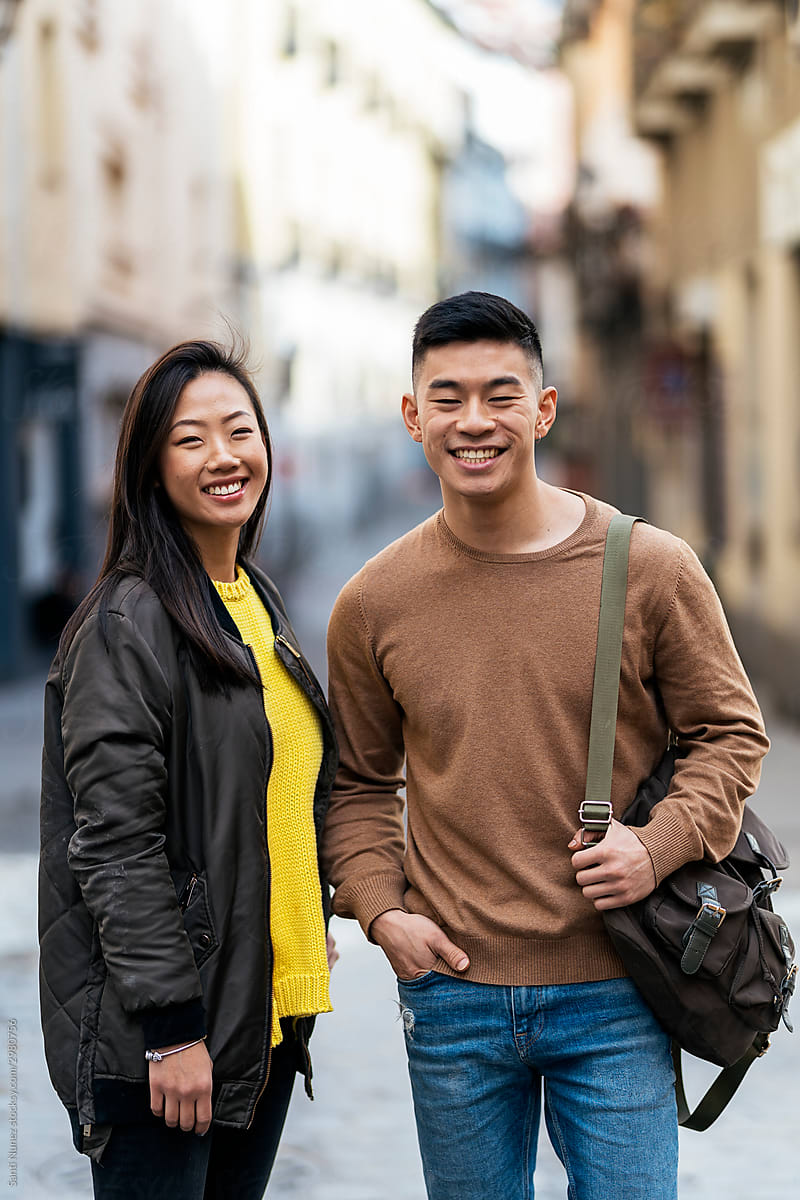 Portrait of chinese couple smiling.