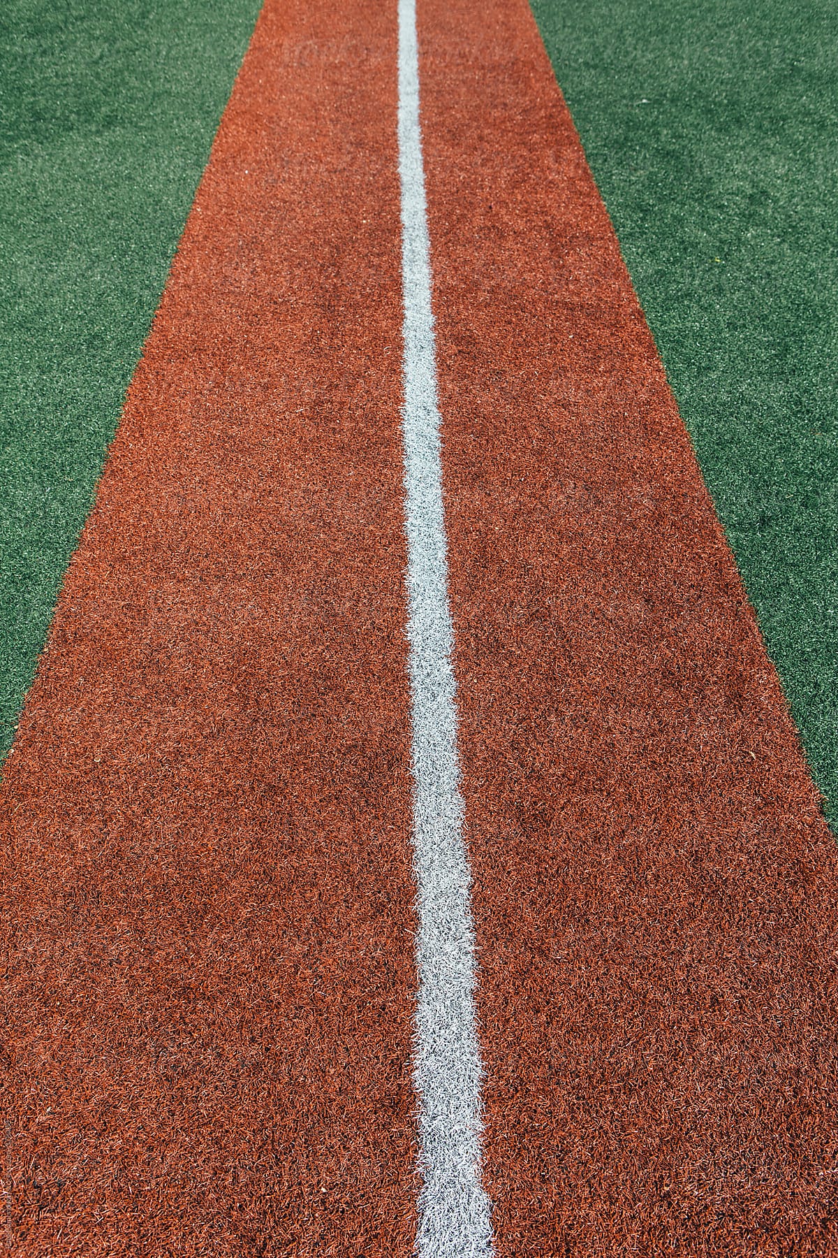 Boundary lines on artificial turf sports field