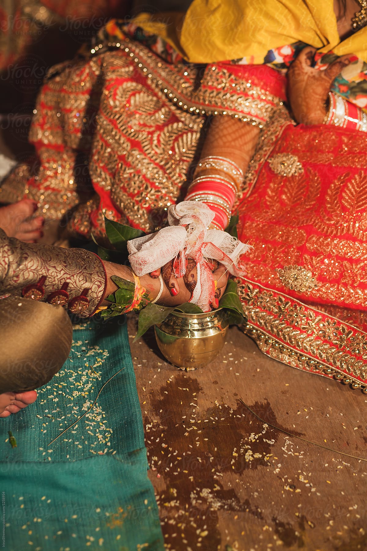 Detail shot of hands at an Indian wedding ceremony